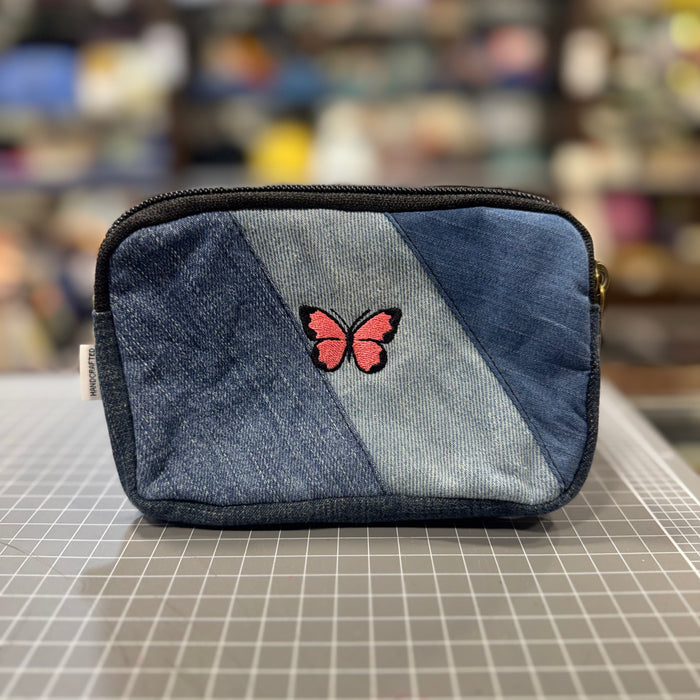 The Pink Butterfly 🦋 on Denim Embroidered Phone + Passport Sleeve