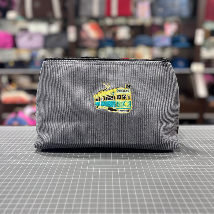 The Tram 🚃 on Gray Corduroy Large Toiletry + Makeup Bag
