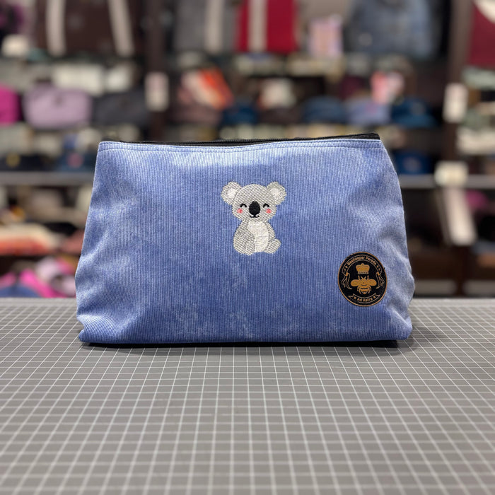 The Koala 🐨 Sky Blue Corduroy Large Toiletry + Makeup Bag