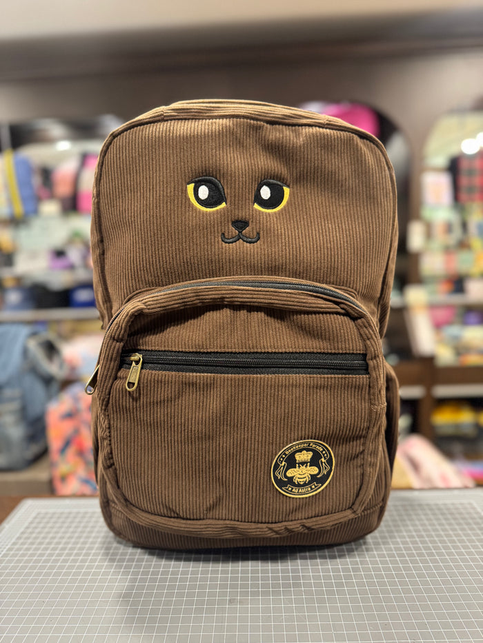 The Cat Face 🐱 on Chocolate Corduroy Royal BeeKeeper Backpack